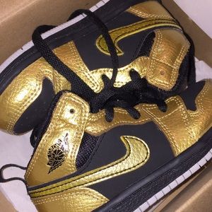 Black and gold jordans